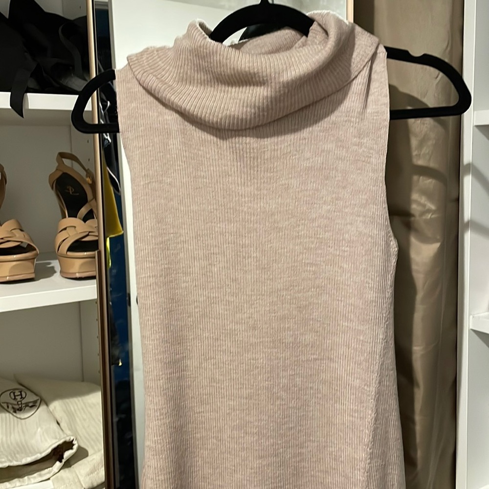 BCBG, very light sweater, midi dress, with a slit in the front.